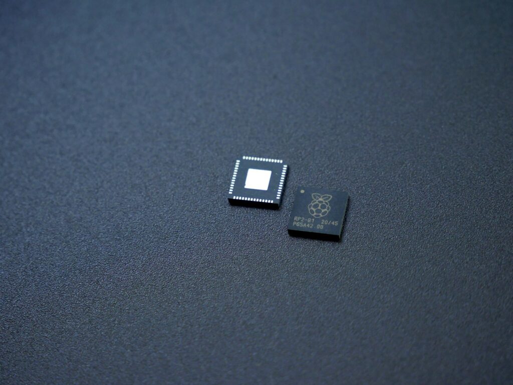 Microcontroller ICs resting on a workbench
